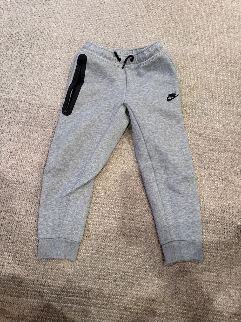 Nike Tech Grey Kids Fleece Joggers with Black Zip Pocket